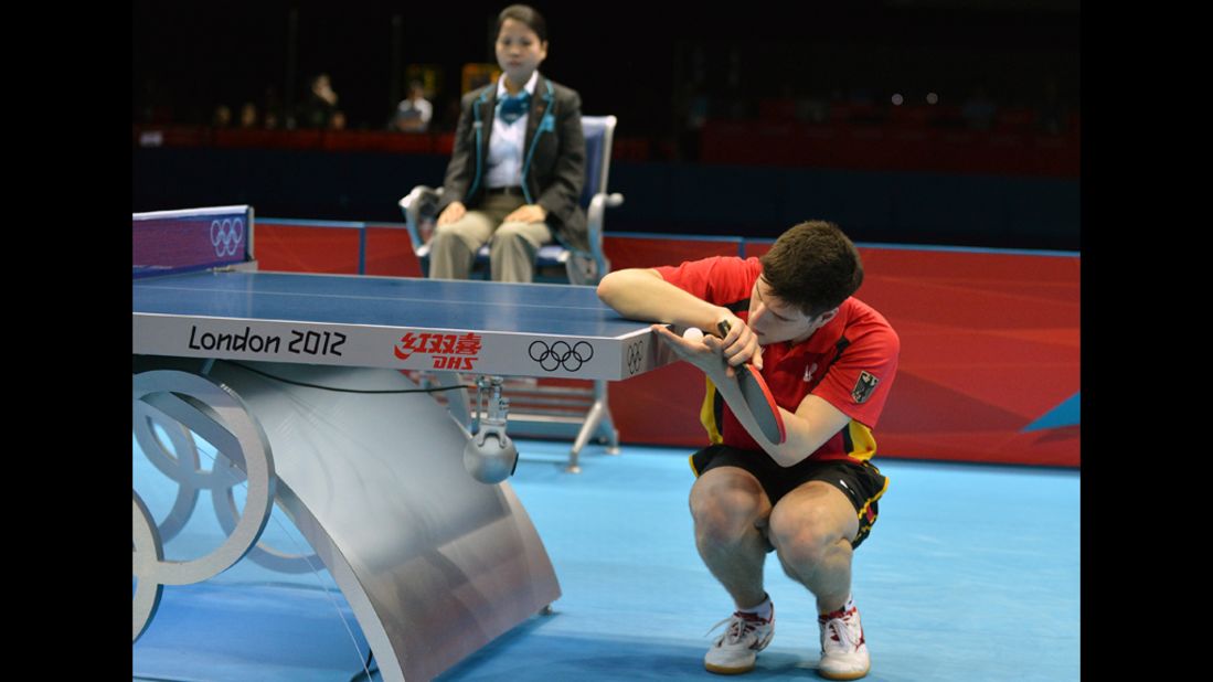 Dimitrij Ovtcharov of Germany serves during a men's table-tennis singles semifinal match.