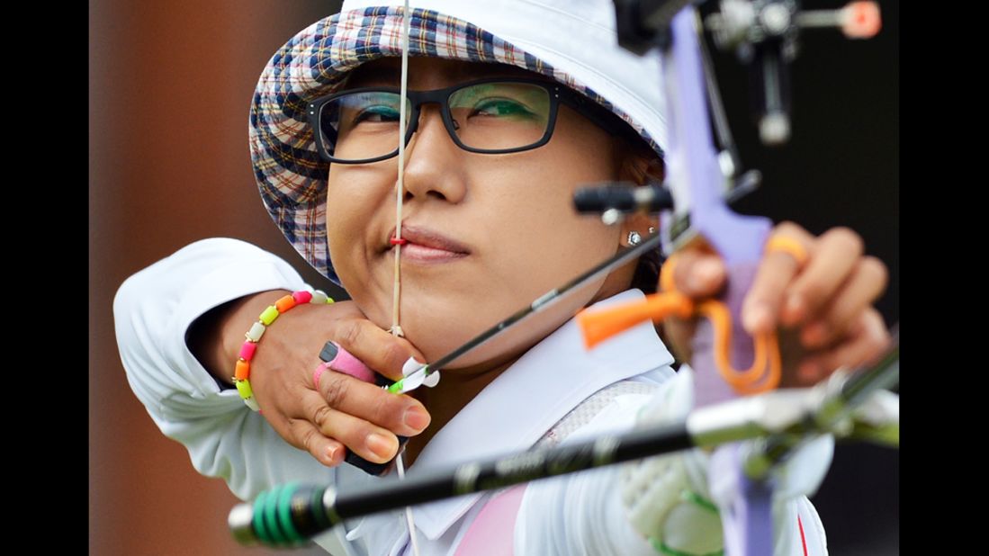 South Korea's Lee Sung-Jin competes in the women's individual 1/8 archery elimination match at Lord's Cricket Ground.