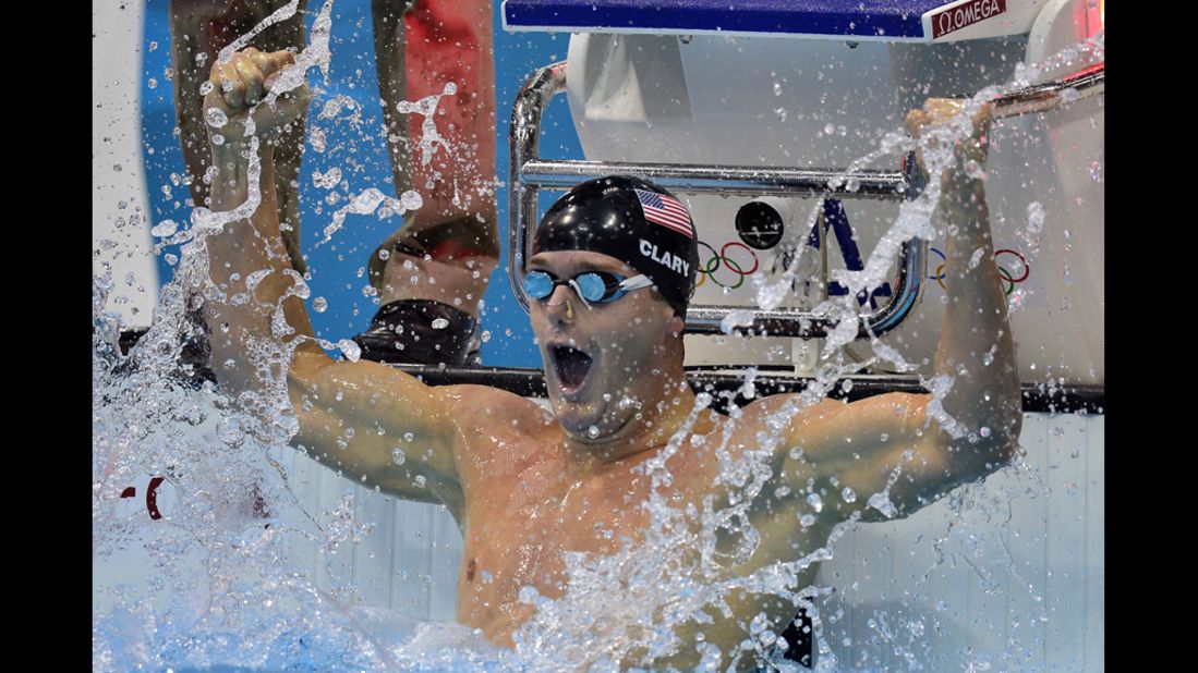Tyler Clary celebrates winning gold in the men's 200-meter backstroke final swimming event.