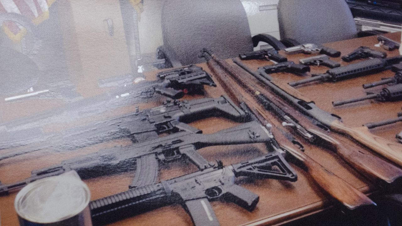 Police found an arsenal of weapons in the home of a Maryland man accused of making threats against his workplace.