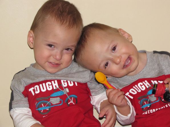 Andrew, left, and Patrick show off their tough guy status at 18 months. 