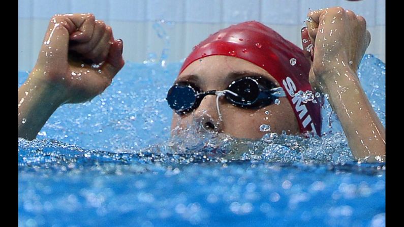 Britain's Amy Smith reacts after competing in the women's 50-meter freestyle swim-off.