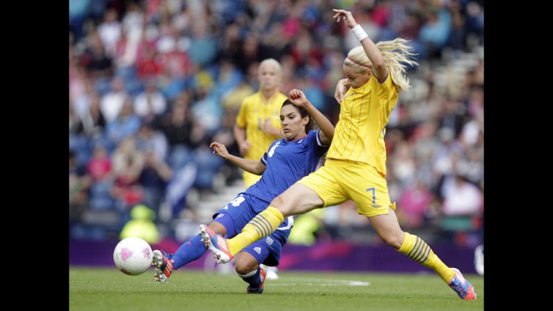Sweden's Lisa Dahlkvist, right, vies with France's Louisa Necib during a women's football match at Hampden Park in Glasgow, Scotland.