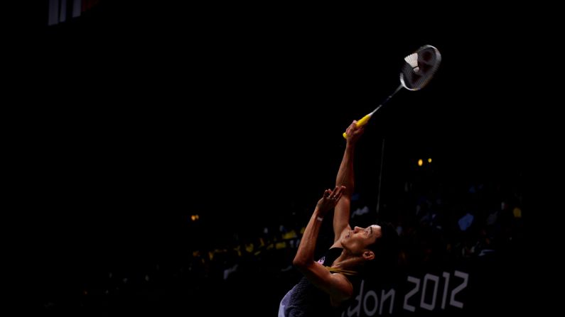 Malaysia's Chong Wei Lee takes a swing in the men's singles badminton semifinal.