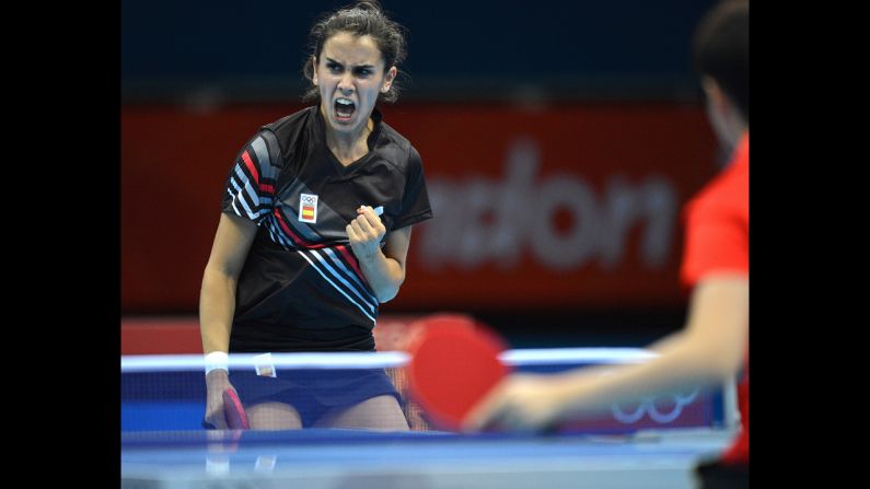 Sara Ramirez of Spain gets a point against China's Guo Yue during a table-tennis match.