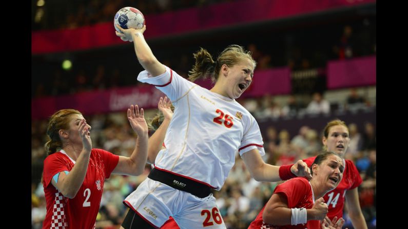 Montenegro pivot Suzana Lazovic jumps to shoot during a women's preliminary handball match against Croatia.
