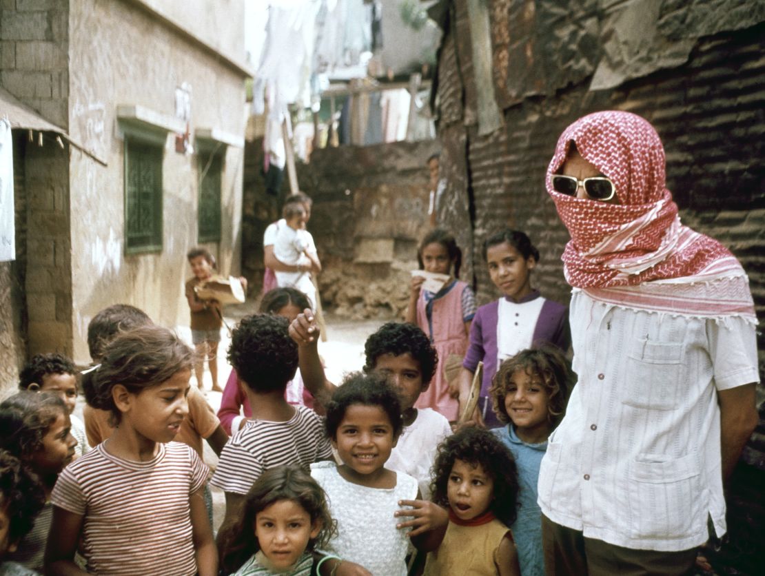 Palestinian refugees pose to be photographed in a Beirut refugee camp in 1973.
