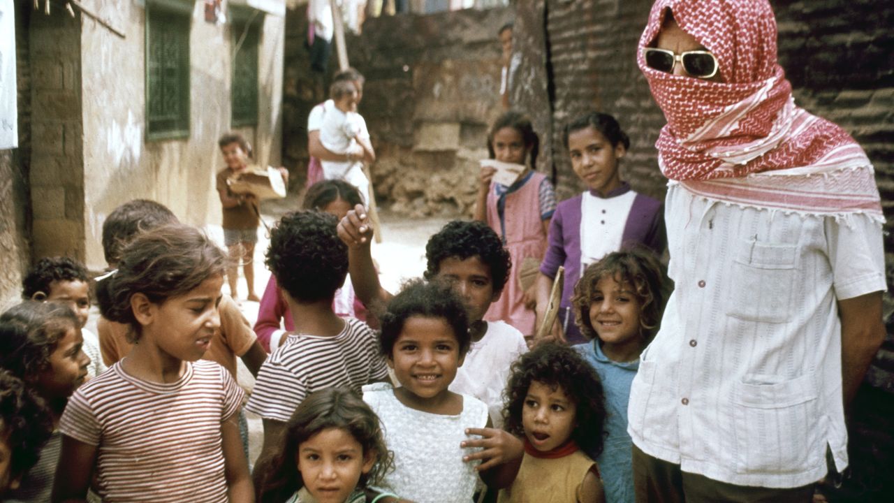 Palestinian refugees pose to be photographed in a Beirut refugee camp in 1973.