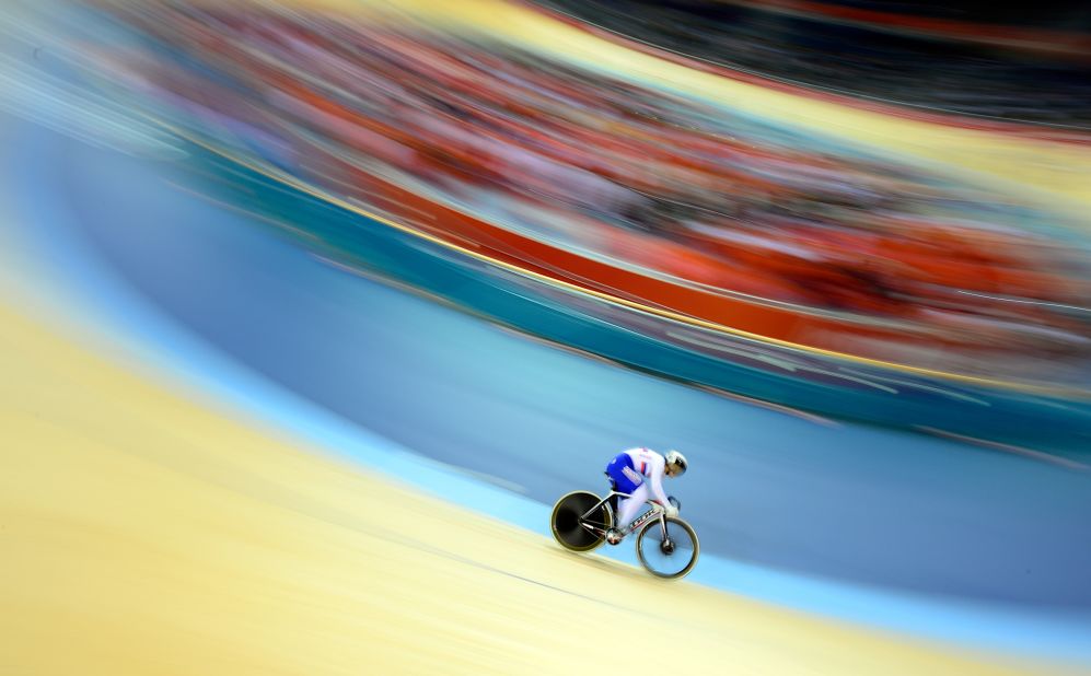 Russia's Ekaterina Gnidenko warms up before the women's cycling-track keirin event.