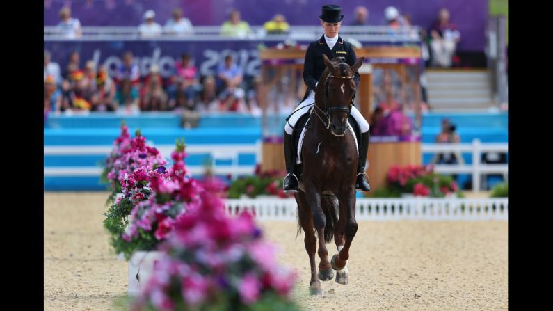 Helen Langehanenberg of Germany rides Damon Hill in the dressage grand prix.