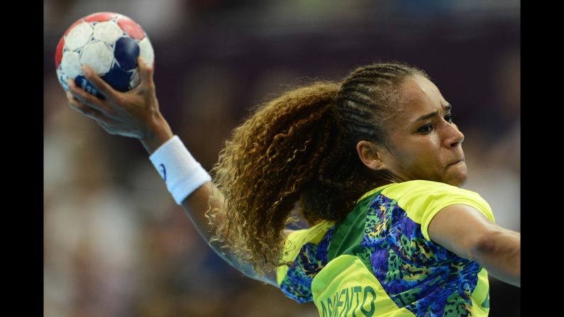 Brazil's Alexandra Nascimento shoots during a women's preliminary handball match against Russia.