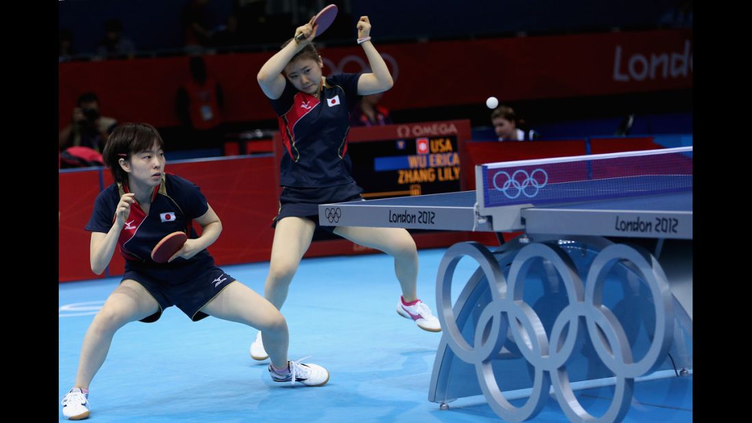 Japan's Kasumi Ishikawa, left, and Ai Fukuhara compete against a U.S. team in the women's team table-tennis action.