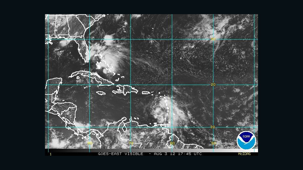 A NOAA satellite image shows Tropical Storm Ernesto in the Caribbean Sea, just west of the Windward Islands, on Friday.