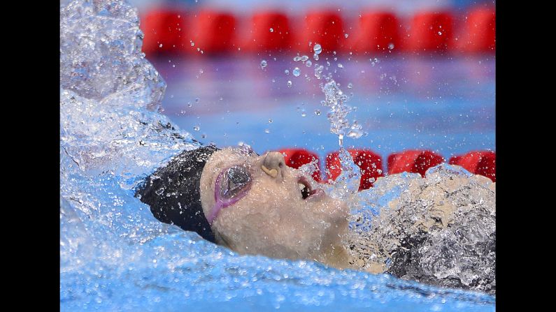 Missy Franklin competes in the women's 200-meter backstroke final. Franklin took gold in the event and American Elizabeth Beisel took bronze.