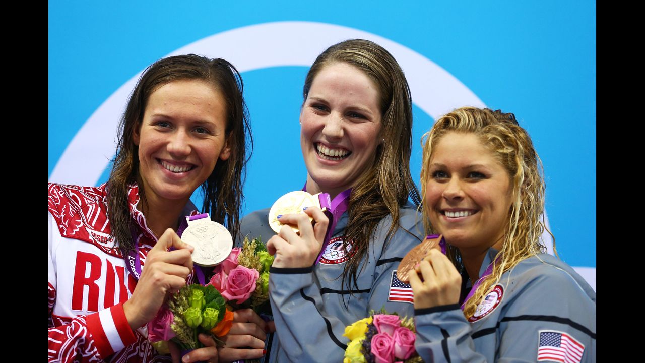 Left to right: Silver medalist Anastasia Zueva of Russia, gold medalist Missy Franklin of the United States and bronze medalist Elizabeth Beisel of the United States on the podium during the medal ceremony for the women's 200-meter backstroke final on Day 7 of the London 2012 Olympic Games.
