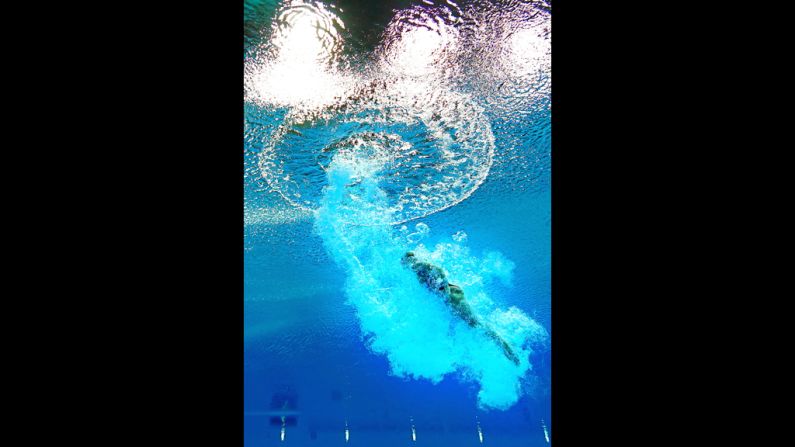 Emilie Heymans of Canada competes in the women's 3-meter springboard diving preliminary round on Day 7 of the London 2012 Olympic Games at the Aquatics Centre on Friday, August 3, in London.