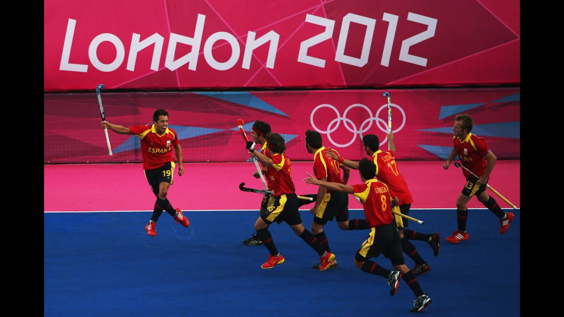 Marc Salles of Spain celebrates after scoring a goal during the men's hockey match against South Africa.