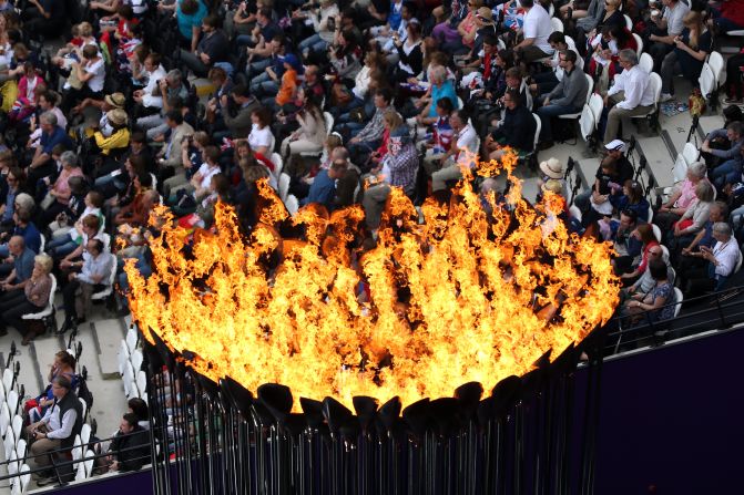 The Olympic Cauldron burns at the Olympic Stadium.