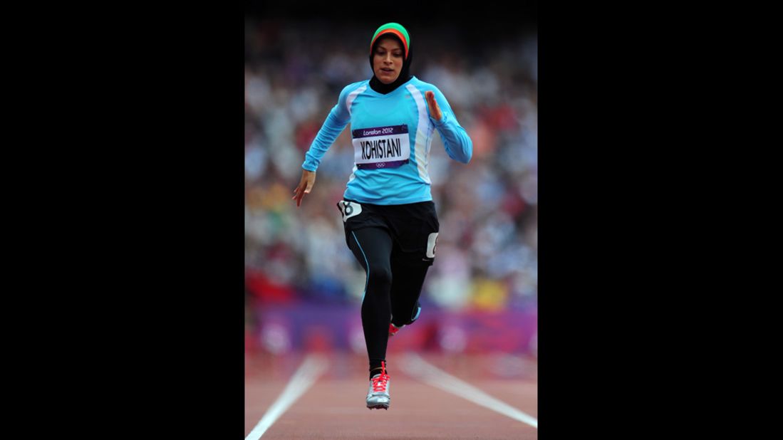 Tahmina Kohistani of Afghanistan competes in the women's 100-meter heat.