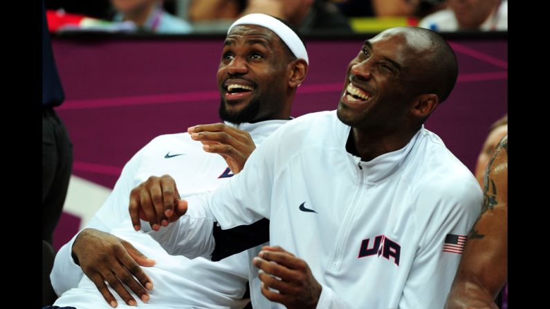 LeBron James, left, and Kobe Bryant watch the men's basketball preliminary round match on Thursday, August 2 in London. Check out <a href="index.php?page=&url=http%3A%2F%2Fwww.cnn.com%2F2012%2F08%2F01%2Fworldsport%2Fgallery%2Folympics-day-five%2Findex.html" target="_blank">Day 5 of competition</a> from Wednesday, August 1. The Games ran through August 12. 