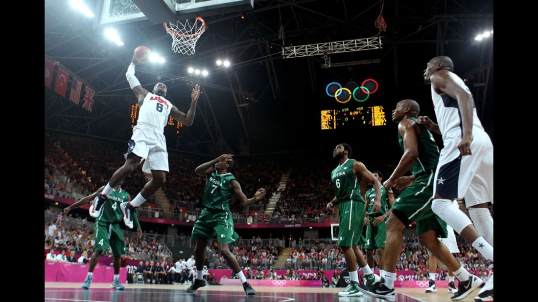 LeBron James jumps for two in the first half during the men's basketball preliminary round match against Nigeria. The U.S. team beat Nigeria 156-73, breaking the Olympic record for most points scored in a basketball game.