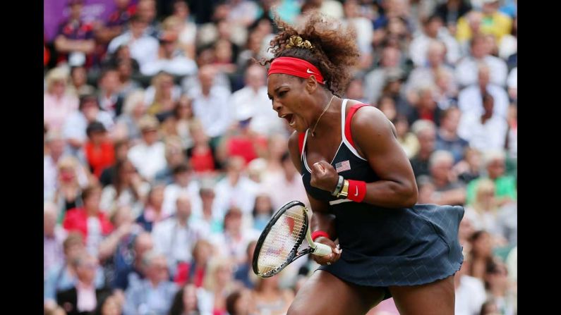 Serena Williams reacts to winning the gold medal in the women's singles tennis event.