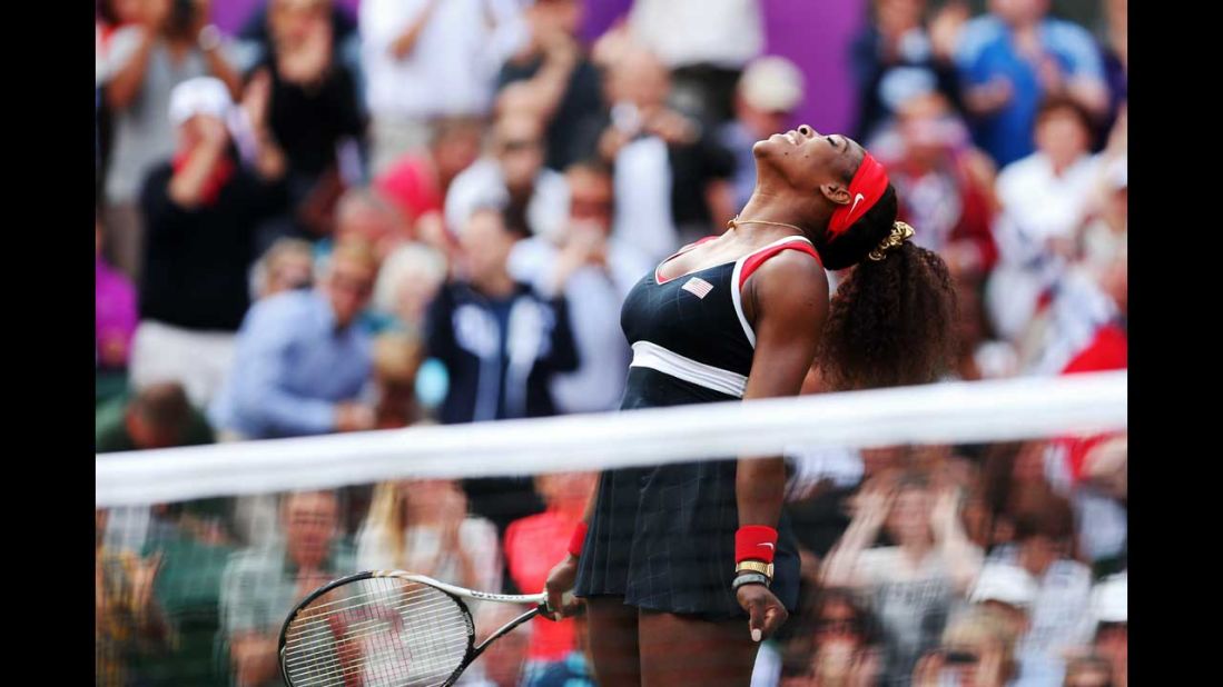 Serena Williams reacts after defeating Maria Sharapova of Russia to win the gold medal in women's singles tennis at Wimbledon. Williams won 6-0, 6-1.