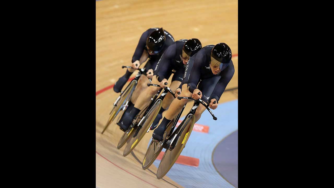Jaime Nielsen, Alison Shanks and Lauren Ellis of New Zealand in action during the women's team pursuit track cycling first round heat against Belarus.
