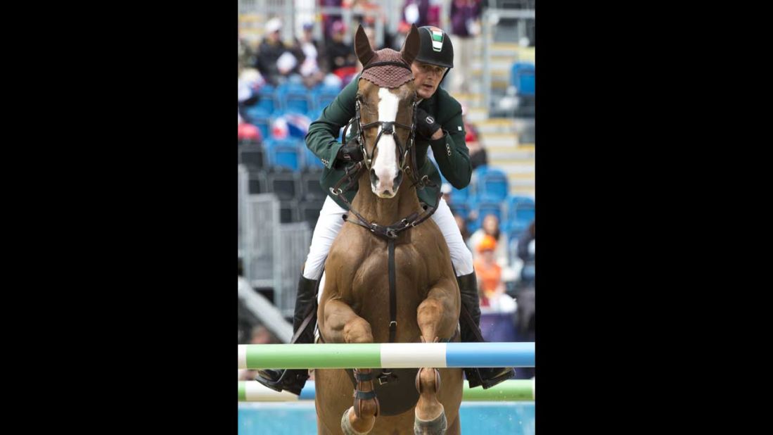 Ireland's Bill Twomey, on Tinka's Serenade, competes in the first individual show jumping qualifier.