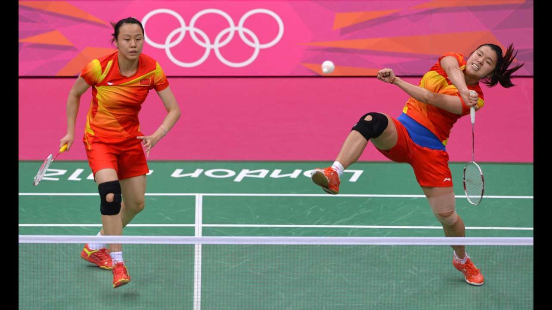 China's Zhao Yunlei, left, and Tian Qing, right, play against Mizuki Fuji and Reika Kakiiwa (not pictured) in the women's doubles badminton final match.