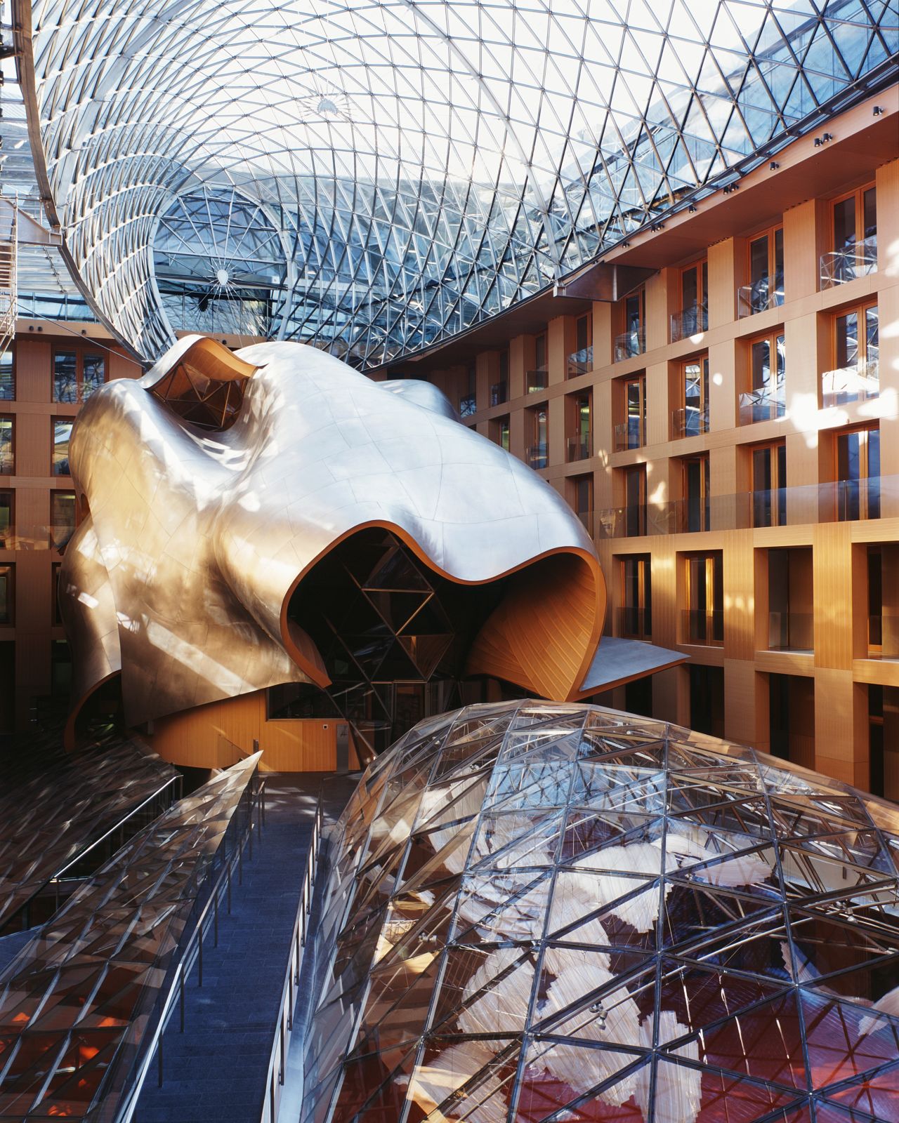 Designed by Frank O Gehry, the DZ Bank in Berlin has an inner courtyard which houses a conference room that looks more like a sculpture. 