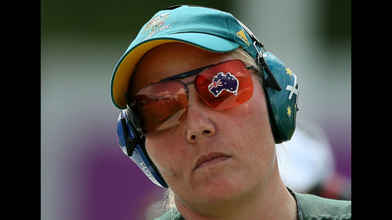 Australia's Corey Cogdell, sporting the map of her country on her glasses, competes in the women's trap shooting final.