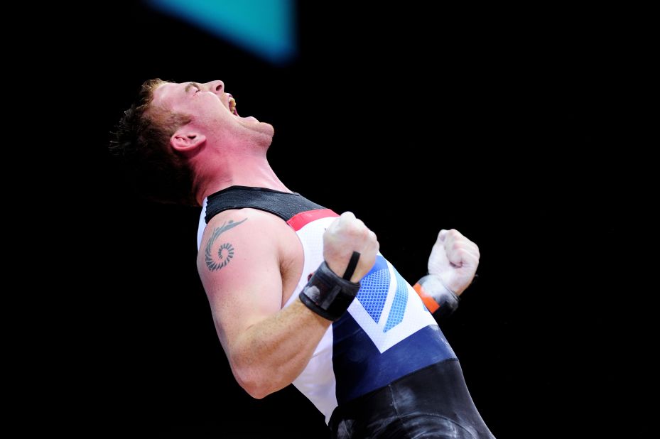 Peter Kirkbride of Great Britain competes in the men's 94-kilogram weightlifting final.