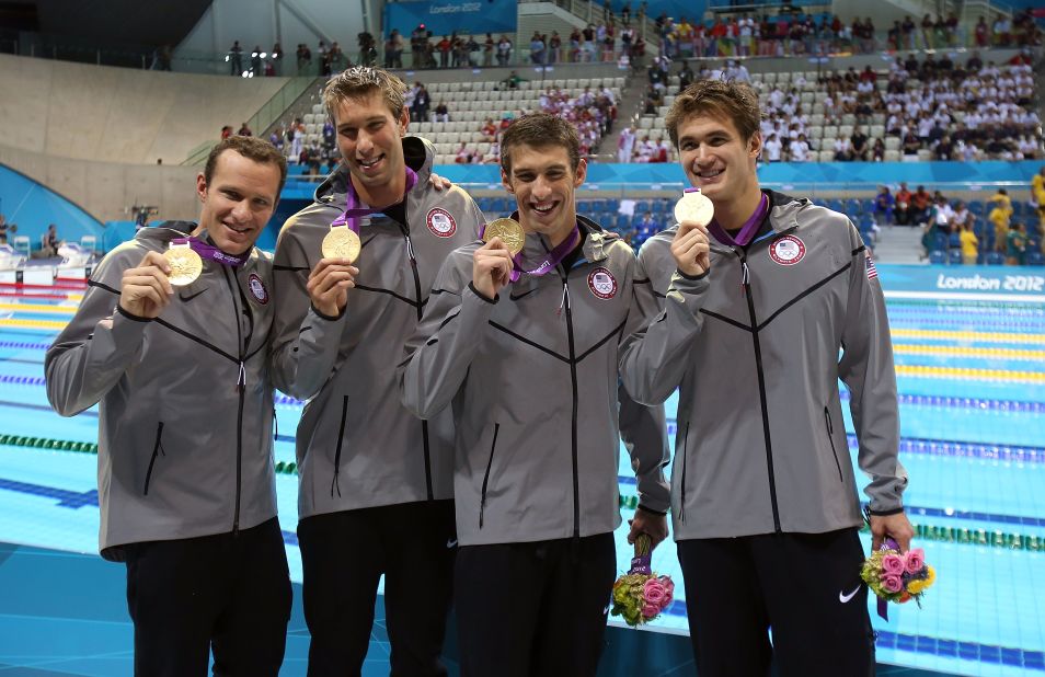 Left to right: Brendan Hansen, Matthew Grevers, Michael Phelps and Nathan Adrian pose following the medal ceremony for the men's 4x100-meter medley on Saturday, August 4.