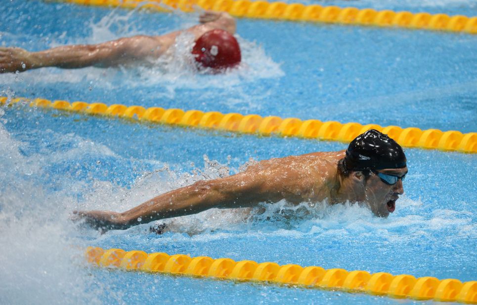 Michael Phelps competes in the men's 4x100-meter medley relay final.