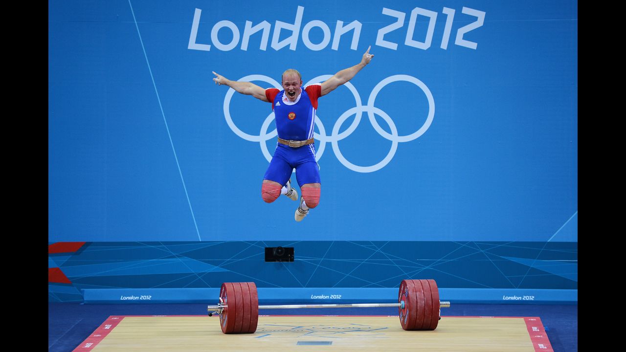 Andrey Demanov of Russia celebrates during the men's 94kg weightlifting final.