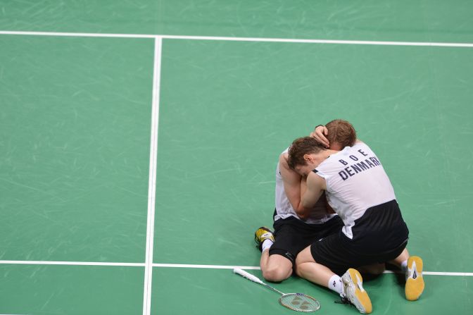 Denmark's Mathias Boe and Carsten Mogensen celebrate their victory over Chung Jae Sung and Lee Yong Dae of South Korea during the semifinal men's doubles badminton match. Check out photos from<a href="index.php?page=&url=http%3A%2F%2Fwww.cnn.com%2F2012%2F08%2F05%2Fworldsport%2Fgallery%2Folympics-day-9%2Findex.html" target="_blank"> Day 9 of the competition </a>on Sunday, August 5.