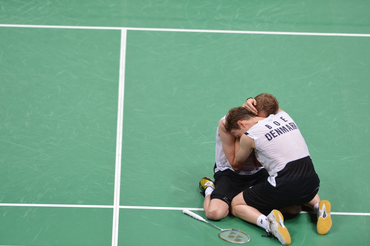 Denmark's Mathias Boe and Carsten Mogensen celebrate their victory over Chung Jae Sung and Lee Yong Dae of South Korea during the semifinal men's doubles badminton match. Check out photos from<a href="http://www.cnn.com/2012/08/05/worldsport/gallery/olympics-day-9/index.html" target="_blank"> Day 9 of the competition </a>on Sunday, August 5.