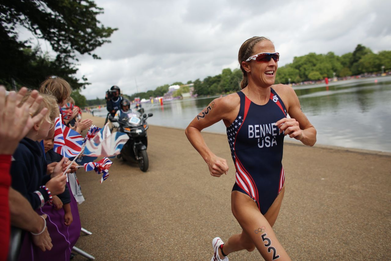 Laura Bennett of the United States runs in the women's triathlon Saturday in Hyde Park.