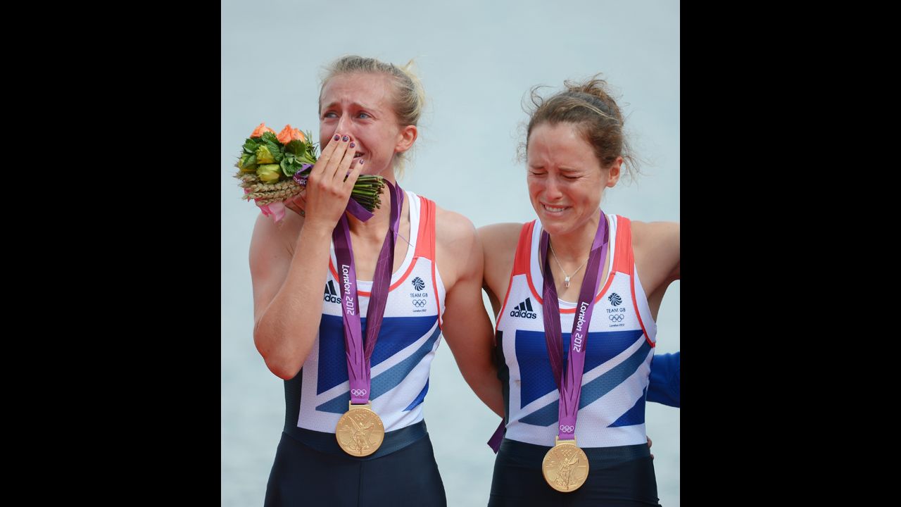 Katherine Copeland and Sophie Hosking of Great Britain celebrate with their gold medals during the medal ceremony for the lightweight women's double sculls.