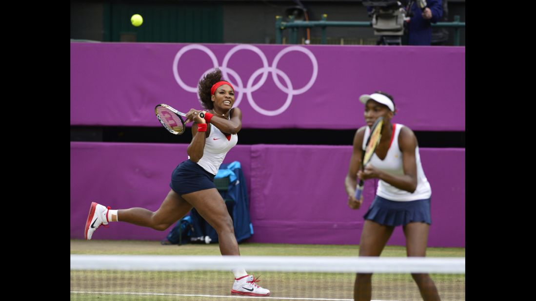 Serena Williams, left, and Venus Williams play the Czech Republic's Andrea Hlavackova and Lucie Hradecka at the women's doubles gold medal match.