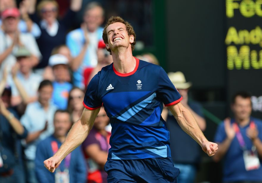 Andy celebrates as he plays against Switzerland's Roger Federer during the men's singles gold medal match of the London 2012 Olympic Games at Wimbledon. Murray won the match in straight sets. It paved the way for his grand slam success.