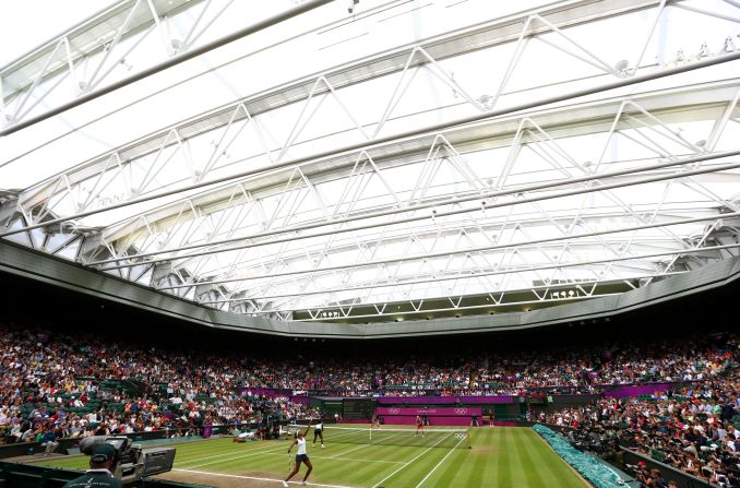 Serena and Venus Williams serve the ball to Andrea Hlavackova and Lucie Hradecka of the Czech Republic during the women's doubles final. The Williams sisters went on to win the gold medal, which they also won at the 2008 Olympics.
