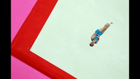 Enrique Tomas Gonzalez Sepulveda of Chile soars above the floor during the artistic gymnastics men's floor exercise final.