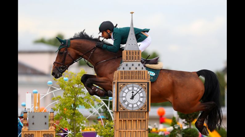 Kamal Bahamdan of Saudi Arabia riding Noblesse Des Tess jump over an obstacle in the second qualifier of individual jumping.