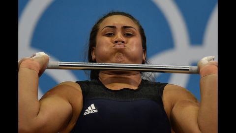 Luisa Peters of the Cook Islands lifts during the women's 75-plus kilogram group A weightlifting event.