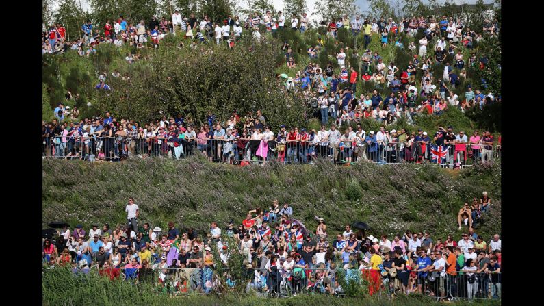 Crowds gather in Olympic Park on Day 9 to watch Andy Murray on the big screens win his gold medal in the men's singles tennis match.