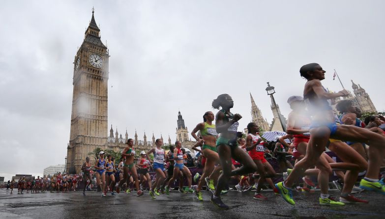 Competitors take part in the women's marathon event as rain falls on Day 9 of the London 2012 Olympics.