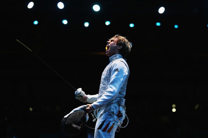 Peter Joppich of Germany celebrates beating Alexey Cheremisinov of Russia during the men's foil team fencing quarterfinal. Check out photos of <a href="index.php?page=&url=http%3A%2F%2Fwww.cnn.com%2F2012%2F08%2F06%2Fworldsport%2Fgallery%2Folympics-day-ten%2Findex.html" target="_blank">Day 10 of the competition</a> from Monday, August 6.