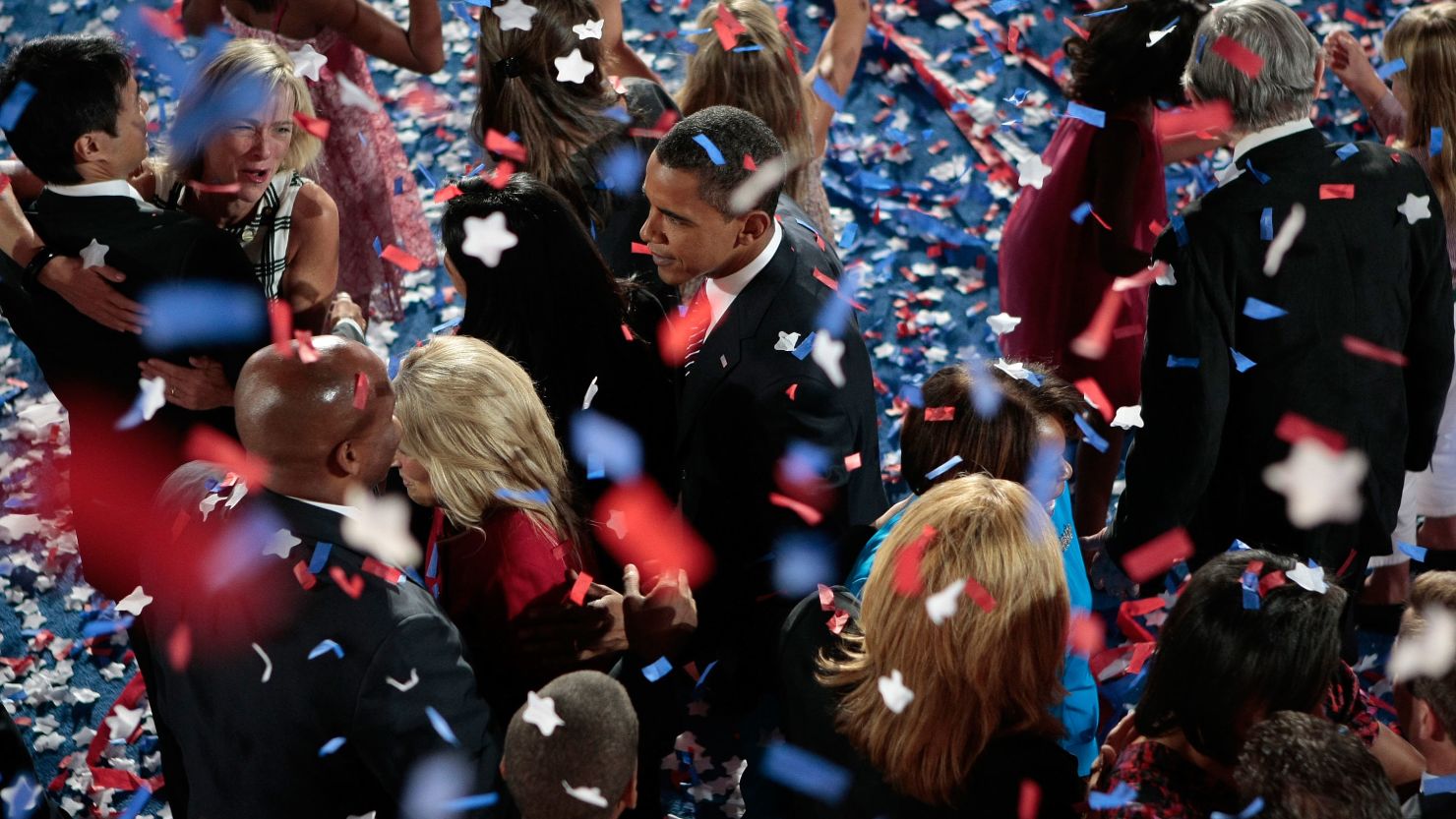 Then-Sen. Barack Obama stands among well-wishers at the 2008 Democratic National Convention in Denver.